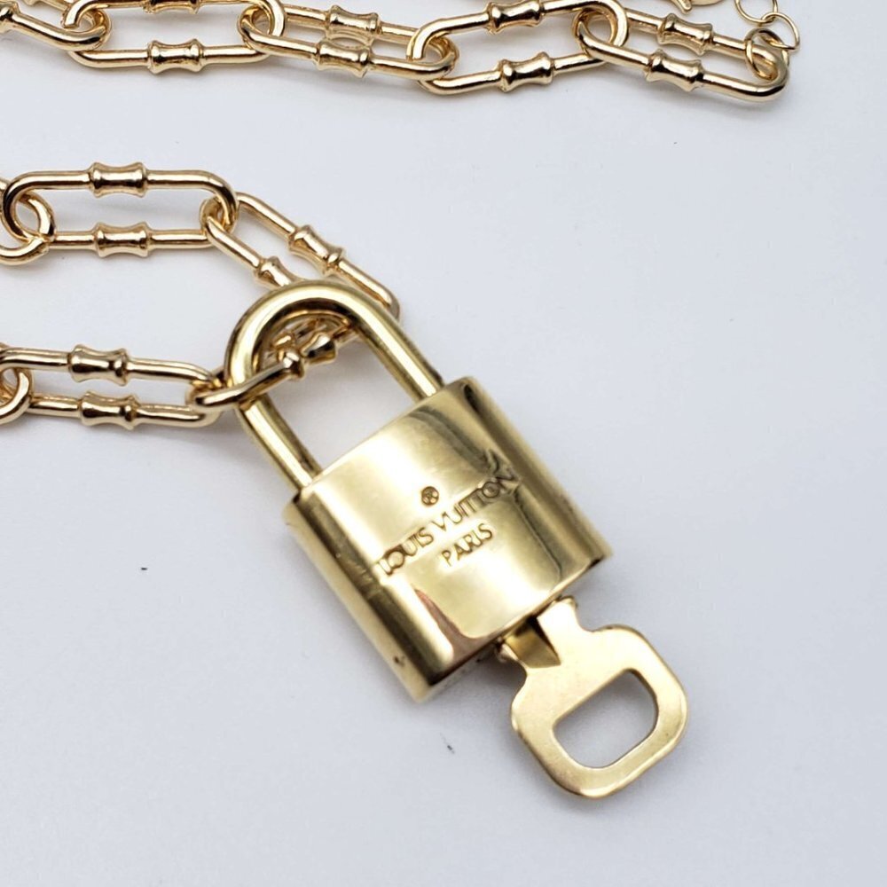 Authentic Louis Vuitton Lock and Key Gold Color with Gold Plated Chain Necklace - Picture 6 of 11